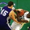 Photo: Green Valley's Durrell McDonald pulls a rebound aw Photo: Green Valley's Durrell McDonald pulls a rebound aw