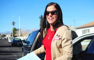 Western High School Principal Neddy Alvarez and volunteers go door-to-door, encouraging drop-out students to return to class. Western High School staff and about 35 volunteers went door to door on Saturday, Jan. 28, 2012, to encourage 56 students who have dropped out to return to school. The personal home visits are part of a district-wide graduation initiative targeting about 10,000 students at risk of not graduating in June. 
