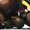 Photo: Rashad Evans, left, takes down Phil Davis in a Lig