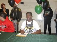 Palo Verde High School's Jerrol Garcia-Williams signs his national letter of intent Feb. 1, 2012, to play football at the University of Hawaii.