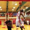 Photo: Valley High School's Caleb Carter dunks to finish Photo: Valley High School's Caleb Carter dunks to finish