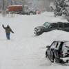 A man walks through the snow, Friday, Feb. 3, 2012, in Denver. A powerful winter storm swept across Colorado today as it headed east, bringing blizzard warnings to eastern Colorado and winter storm warnings for southeast Wyoming, western Kansas and western Nebraska. A man walks through the snow, Friday, Feb. 3, 2012, in Denver. A powerful winter storm swept across Colorado today as it headed east, bringing blizzard warnings to eastern Colorado and winter storm warnings for southeast Wyoming, western Kansas and western Nebraska.