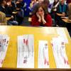 Votes are counted for Precinct 7405 during the Republican presidential caucus at Green Valley High School in Henderson on Saturday, Feb. 4, 2012. Ron Paul won the precinct with 16 votes. Mitt Romney came in second with 10 votes.