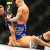 Photo: Dustin Poirier submits Max Holloway during the fir