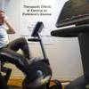 Dean Bengert rides a stationary bicycle at the Cleveland Clinic Lou Ruvo Center for Brain Health Monday, February 6, 2012. Bengert, 52, is participating in a clinical trial that is studying the effect of exercise on patients with Parkinson's disease.