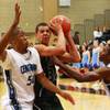 Palo Verde's Jordyn Martin is guarded by Cenetnnial's Evan Martin, left, and Neiman Lee during their Sunset Regional semifinal game Thursday, Feb. 16, 2012.