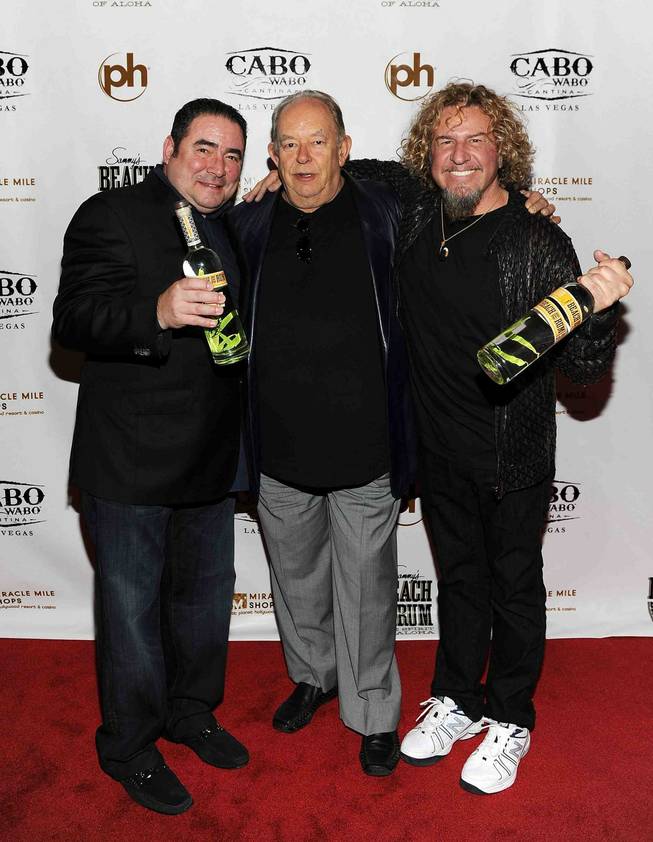 Sammy Hagar, right, with chef Emeril Lagasse and Robin Leach, launches Sammy's Beach Bar Rum at his Cabo Wabo Cantina in Planet Hollywood's Miracle Mile Shops on Friday, Feb. 17, 2012.