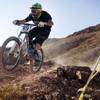 A rider competes in the Downhill at Reaper Madness at Bootleg Canyon in Boulder City on Sunday, Feb. 19, 2012.