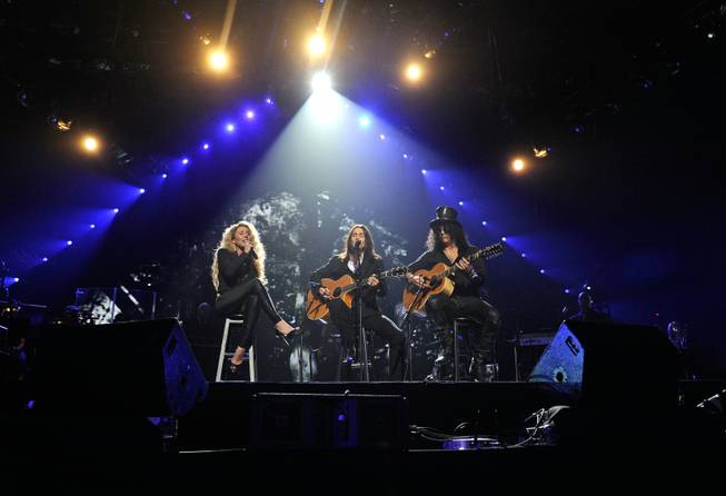 LAS VEGAS, NV - FEBRUARY 18: (EXCLUSIVE COVERAGE) Singer Haley Reinhart, musician Myles Kennedy and recording artist Slash perform onstage at the Keep Memory Alive foundation's "Power of Love Gala" celebrating Muhammad Ali's 70th birthday at the MGM Grand Garden Arena February 18, 2012 in Las Vegas, Nevada. The event benefits the Cleveland Clinic Lou Ruvo Center for Brain Health and the Muhammad Ali Center. (Photo by Ethan Miller/Getty Images for Keep Memory Alive)