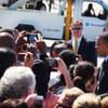 President Barack Obama greets people after arriving at McCarran Airport in Las Vegas on Wednesday, March 21, 2012.