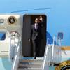 President Barack Obama arrives at McCarran Airport in Las Vegas on Wednesday, March 21, 2012, for an energy policy speech at a solar plant in Boulder City.