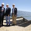 Photo: Secretary of the Interior Ken Salazar, center, pos Photo: Secretary of the Interior Ken Salazar, center, pos