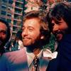 In this undated file photo, from left, members of The Bee Gees Maurice Gibb, Robin Gibb and Barry Gibb pose for a photo. A representative said on Sunday, May 20, 2012, that Robin Gibb died at the age of 62.