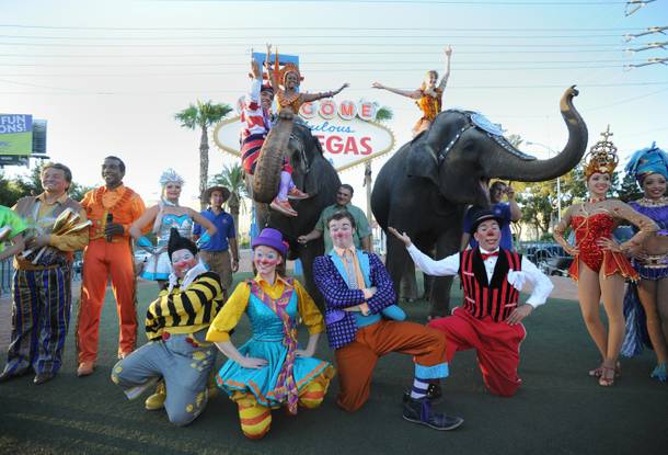 Ringling Bros. and Barnum and Baily circus members at the Welcome to Fabulous Las Vegas sign on Wednesday, June 13, 2012.