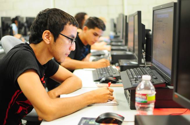 Isaac Robinson, 18, studies at UNLV's Summer Bridge program on Tuesday, July 17, 2012. The new program helps incoming freshmen avoid costly remedial math courses by preparing them for five weeks over the summer to pass a math proficiency exam that places them into a college-level math course.