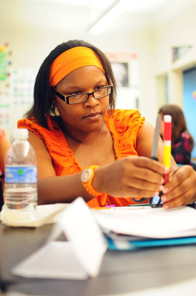 Gilbert Elementary School fourth grade teacher Monique Brass participates in a summer training session on Tuesday, July 24, 2012. More than 5,000 Clark County School District teachers are taking unprecedented professional development opportunities over the summer in a district-wide initiative to boost student achievement in the upcoming school year.