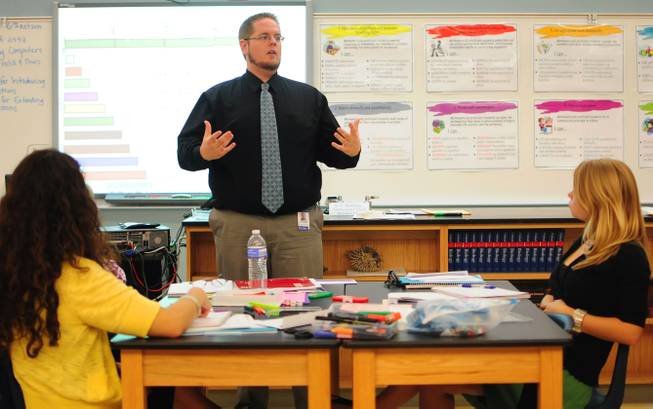 Williams Elementary School K-5 instructional coach Kris Huffman teaches math concepts using a "smartboard" during a summer training session on Tuesday, July 24, 2012. More than 5,000 Clark County School District teachers are taking unprecedented professional development opportunities over the summer in a district-wide initiative to boost student achievement in the upcoming school year.
