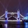 The speedboat, bottom left, carrying the Olympic Flame, heads to Tower Bridge during the Opening Ceremony at the 2012 Summer Olympics, Friday, July 27, 2012, in London. (AP Photo/Vadim Ghirda) The speedboat, bottom left, carrying the Olympic Flame, heads to Tower Bridge during the Opening Ceremony at the 2012 Summer Olympics, Friday, July 27, 2012, in London. (AP Photo/Vadim Ghirda)