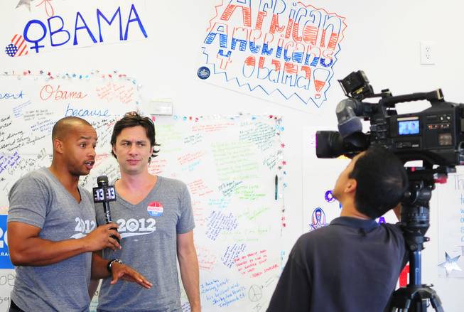 Actors Zach Braff and Donald Faison participate in a media interview at a Barack Obama presidential campaign office in Las Vegas on Saturday, July 28, 2012. The television personalities most known for their roles in the popular sitcom "Scrubs" were in town to support Obama volunteers canvassing in the central valley.