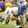 Photo: Moapa Valley running back Conner Mortensen dives i Photo: Moapa Valley running back Conner Mortensen dives i