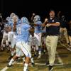 Photo: The Centennial sideline erupts in celebration afte Photo: The Centennial sideline erupts in celebration afte