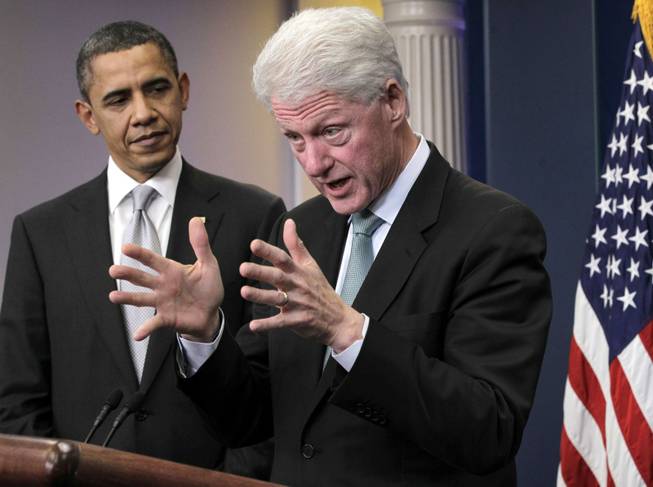 In this Dec. 10, 2010, file photo, President Barack Obama listens as former President Bill Clinton speaks in the briefing room of the White House in Washington. When Bill Clinton takes the convention stage to endorse Barack Obama later this week, it will be a landmark step on a path to reconciliation for two former rivals whose political fortunes are now inextricably tied. By embracing Clinton, Obama hopes to capture the former president's uncanny knack for political survival against tough odds. And it doesn’t hurt that the economy and the nation’s budget picture last truly soared under Clinton.