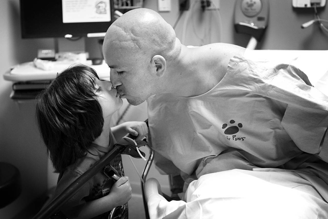 Arturo Martinez-Sanchez kisses his son, Alejandro, 5, before going in for surgery to repair his skull Sept. 12, 2012 at Valley Hospital in Las Vegas.