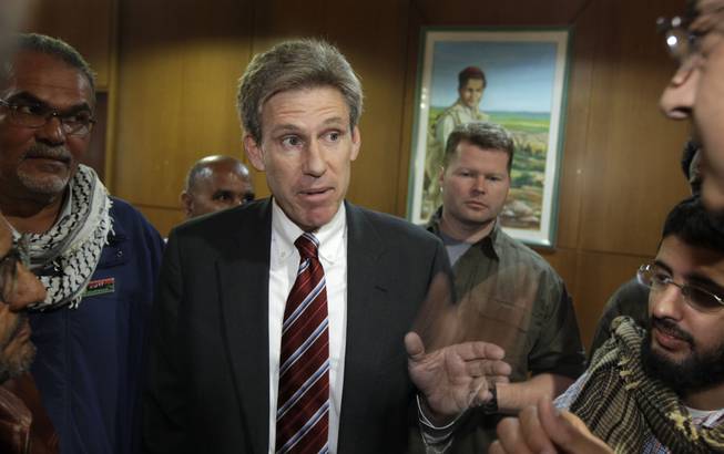 U.S. envoy Chris Stevens speaks to local media at the Tibesty Hotel, where an African Union delegation was meeting with opposition leaders in Benghazi, Libya, on April 11, 2011. Libyan officials say the U.S. ambassador and three other Americans were killed in an attack on the U.S. consulate in the eastern city of Benghazi.