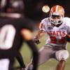 Photo: Bishop Gorman running back Nathan Starks looks for Photo: Bishop Gorman running back Nathan Starks looks for