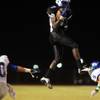 Photo: Devonte Boyd of Basic catches a pass during the He Photo: Devonte Boyd of Basic catches a pass during the He