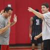 UNLV coaches Heath Schroyer and Dave Rice talk during the Rebels first official practice Friday, Oct. 12, 2012. UNLV coaches Heath Schroyer and Dave Rice talk during the Rebels first official practice Friday, Oct. 12, 2012.
