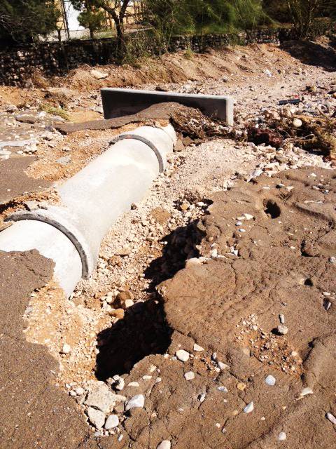 Heavy rains on Thursday evening damaged a drainage structure on Placid Street just south of Windmill Lane in the southern valley. Water rushing through a wash in the area also damaged the roadway, prompting the closure of Placid. “The water came up to the middle of my front yard,” said Ron Falahi, who lives on the edge of the wash.