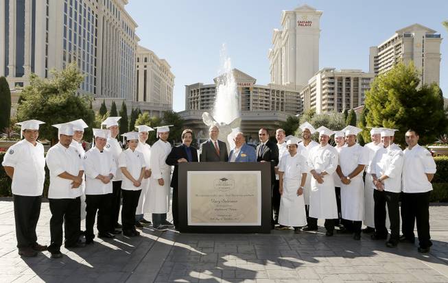 Caesars Palace chefs, entertainment producer Richard Gore, Caesars Palace President Gary Selesner, Food Network co-founder Robin Leach and Cleveland Clinic Lou Ruvo Center for Brain Health Chairman Dr. Jeffrey L. Cummings announce the inaugural Food University Las Vegas at Caesars Palace on Tuesday, Oct. 16, 2012.