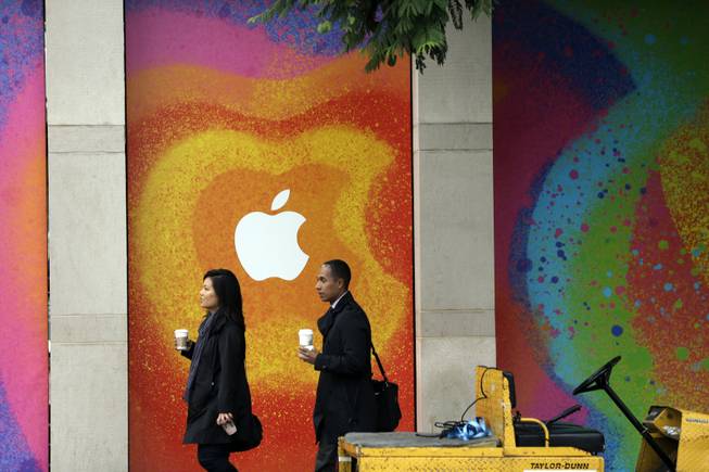 The walls of the California Theater are decorated with an Apple logo in San Jose, Calif., Tuesday, Oct.  23, 2012. Apple is holding an event Tuesday to announce new products. 