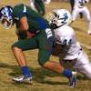 Photo: Green Valley quarterback Christian Lopez is brough Photo: Green Valley quarterback Christian Lopez is brough