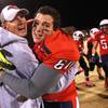 Photo: Coronado coach Brad Talich and defensive end Othma Photo: Coronado coach Brad Talich and defensive end Othma
