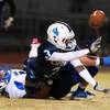 Photo: Canyon Springs AJ Cooper laterals to a teammate on Photo: Canyon Springs AJ Cooper laterals to a teammate on