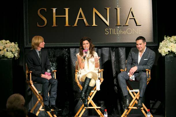 From left, costumier Mark Bouwer, Shania Twain and director Raj Kapoor hold a press conference at Caesars Palace for their upcoming show