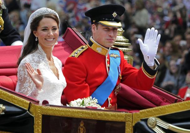 In this Friday April 29, 2011 file photo Britain's Prince William and his bride Kate, Duchess of Cambridge, leave Westminster Abbey, London, following their wedding.