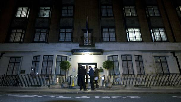 Policeman stand guard outside the King Edward VII hospital where the Duchess of Cambridge has been admitted with a severe form of morning sickness, in London, Monday, Dec. 3, 2012.