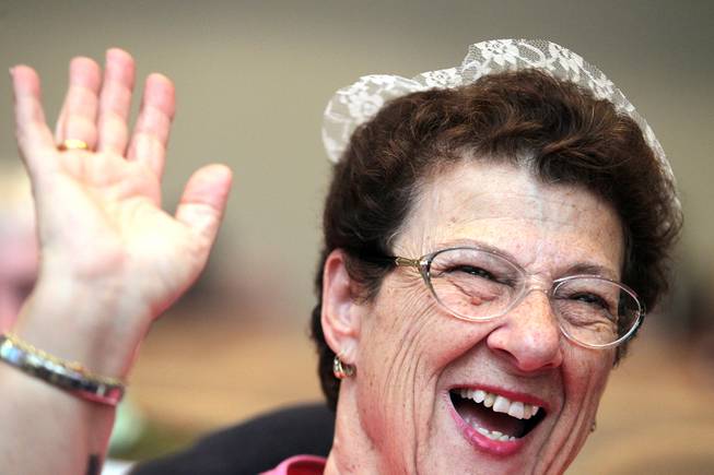 Joan O'Connell watches children from the Sandra & Stanley Mallin Early Childhood Center perform during L'Dor V'Dor at Temple Beth Sholom in Las Vegas on Tuesday, December 4, 2012. L'Dor V'Dor is a Hebrew saying that means "from generation to generation" and is an event which provides entertainment and a hot kosher meal to Las Vegas homebound and facility bound seniors.
