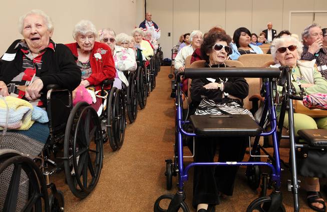 Seniors watch children from the Sandra & Stanley Mallin Early Childhood Center perform during L'Dor V'Dor at Temple Beth Sholom in Las Vegas on Tuesday, December 4, 2012. L'Dor V'Dor is a Hebrew saying that means "from generation to generation" and is an event which provides entertainment and a hot kosher meal to Las Vegas homebound and facility bound seniors.