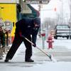 Department of Parks and Recreation employee Phillip Forney shovels snow and ice in downtown Columbus, Ind., Friday, Dec. 21, 2012. The most wintery weather in nearly a year blew into southern Indiana overnight closing or delaying many area schools, slowing traffic at times, and precipitating a few slides-offs. Department of Parks and Recreation employee Phillip Forney shovels snow and ice in downtown Columbus, Ind., Friday, Dec. 21, 2012. The most wintery weather in nearly a year blew into southern Indiana overnight closing or delaying many area schools, slowing traffic at times, and precipitating a few slides-offs.