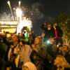 Photo: The crowd watches as fireworks fill the sky during Photo: The crowd watches as fireworks fill the sky during