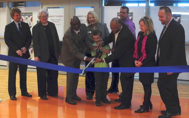 Clark County School District officials, developers and a student cut a ribbon to open Variety School's new campus, 2800 East Stewart Ave., on Monday, Jan. 7, 2013. The replacement school features kitchen facilities, a mock apartment and laundry facilities to teach life and vocational skills to special-needs students.