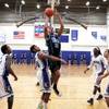 Photo: Chris Echols of Foothill goes up for a basket duri Photo: Chris Echols of Foothill goes up for a basket duri