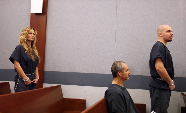 Amy Bessey, left, and her adopted son Michael Bessey appear in Las Vegas Justice Court at the Regional Justice Center in Las Vegas on Thursday, January 10, 2013. Amy and Michael, along with Amy's brother Richard Pearson, have been charged with attempted murder with the use of a deadly weapon, conspiracy to commit murder, and battery with a deadly weapon resulting in substantial bodily harm against Amy's husband, Robert Bessey.