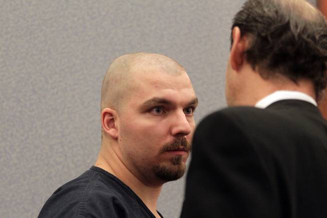 Michael Bessey appears in Las Vegas Justice Court at the Regional Justice Center in Las Vegas on Thursday, January 10, 2013. Bessey has been charged with attempted murder with the use of a deadly weapon, conspiracy to commit murder, and battery with a deadly weapon resulting in substantial bodily harm against his adoptive father, Robert Bessey.