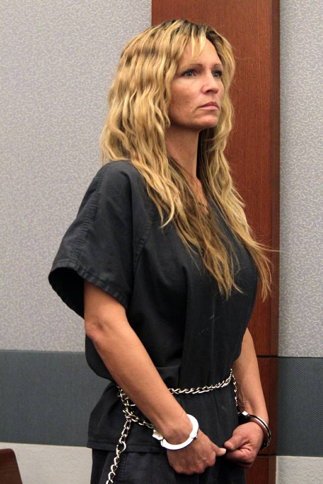 Amy Bessey appears in Las Vegas Justice Court at the Regional Justice Center in Las Vegas on Thursday, January 10, 2013. Bessey has been charged with attempted murder with the use of a deadly weapon, conspiracy to commit murder, and battery with a deadly weapon resulting in substantial bodily harm against her husband, Robert Bessey.