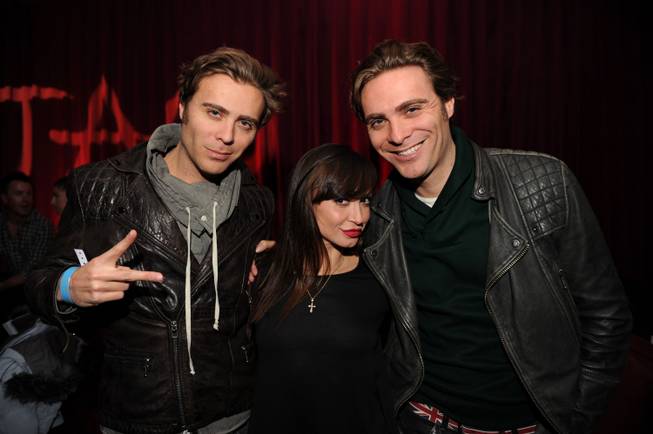 The EC Twins flank Karina Smirnoff at the 2013 Sundance Film Festival in Park City, Utah.